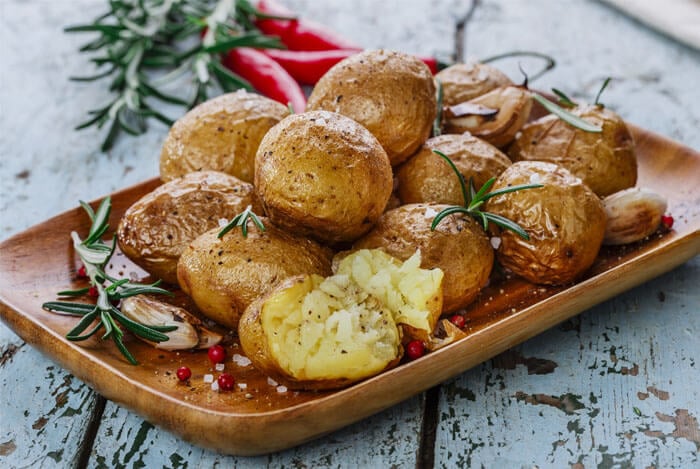 baked potatoes rosemary plate 