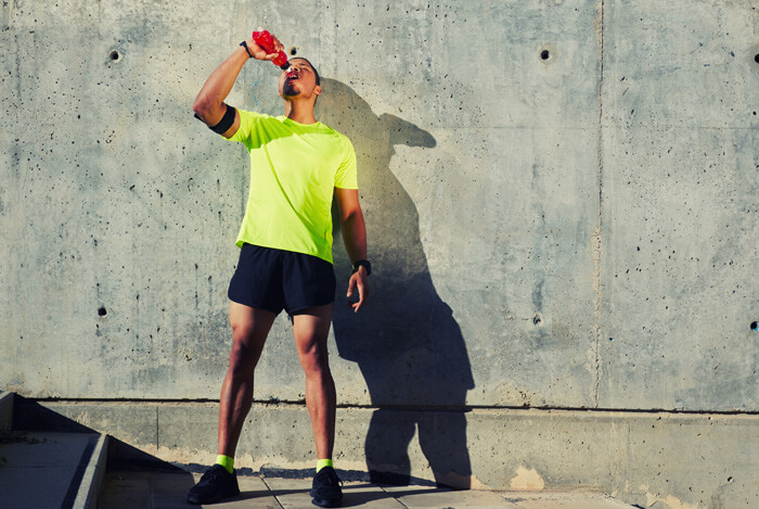 guy drinking sports drink