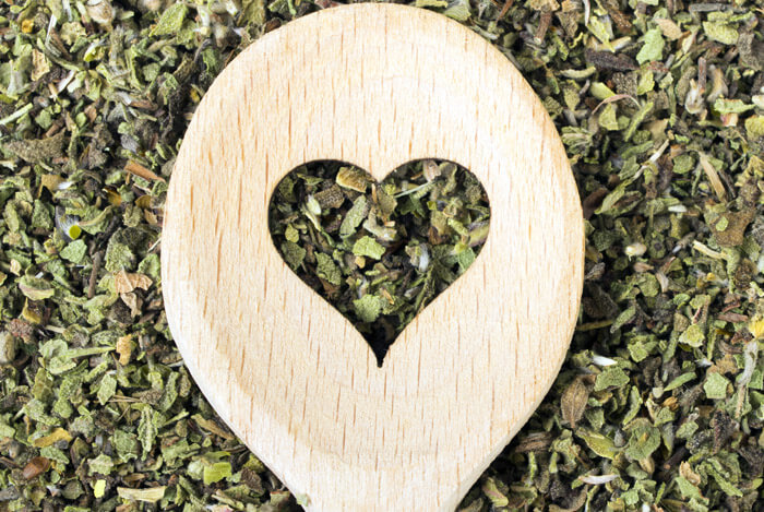 green tea leaves heart spoon