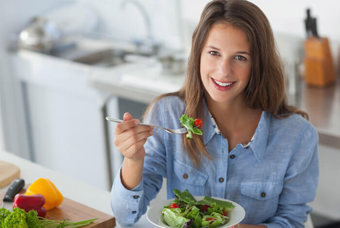 heathly salad eating woman