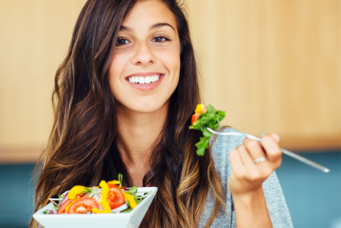 girl eating salad