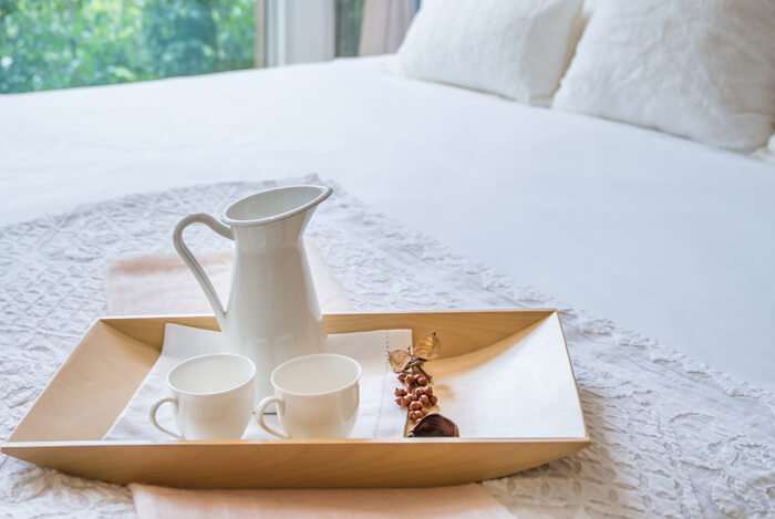 tea tray on bed