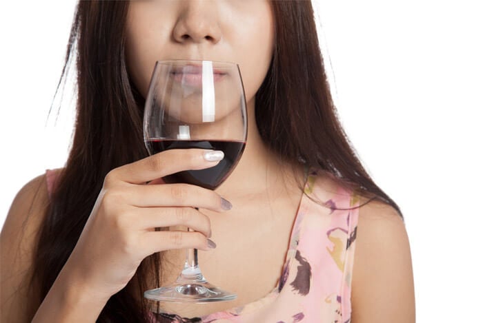 woman drinking red wine glass