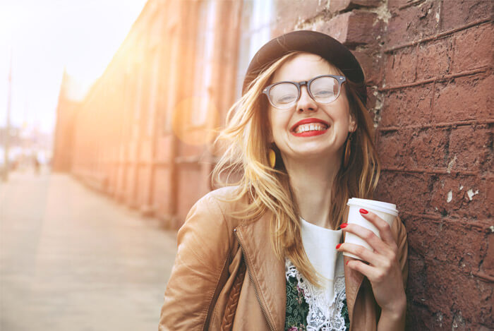 happy woman drinking coffee