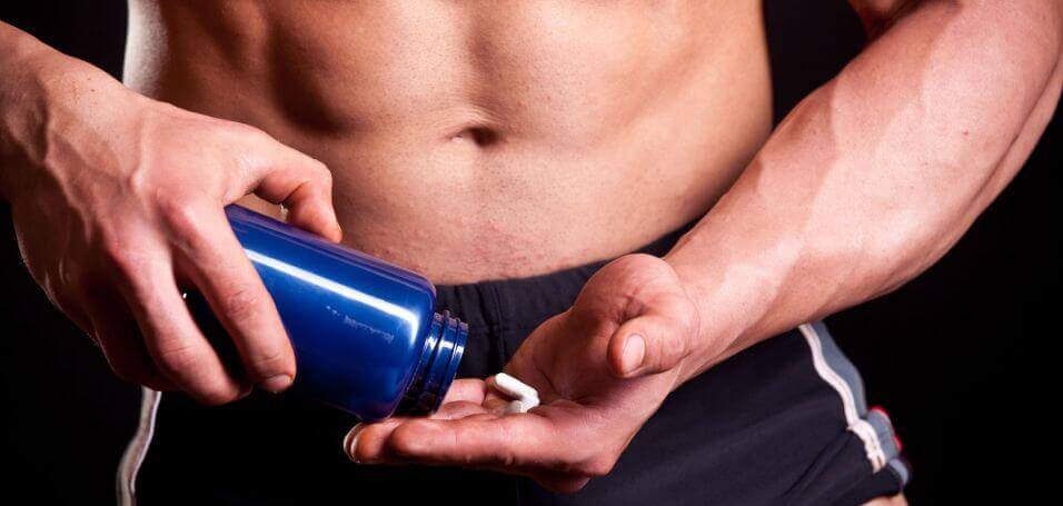 man-taking-workout-supplement