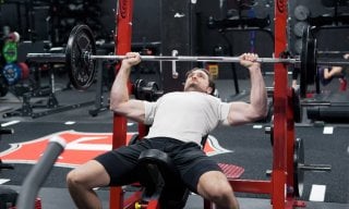 Should You Bench Press with a Smith Machine or a Barbell?