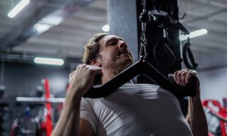 How to Do the Lat Pulldown: Form, Benefits, & Variations