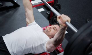 How to Use Leg Drive in the Bench Press to Build More Muscle