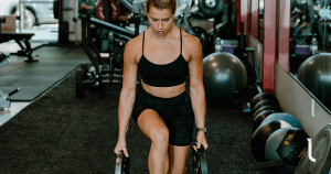 Female doing lunges as part of a lower body workouts for women