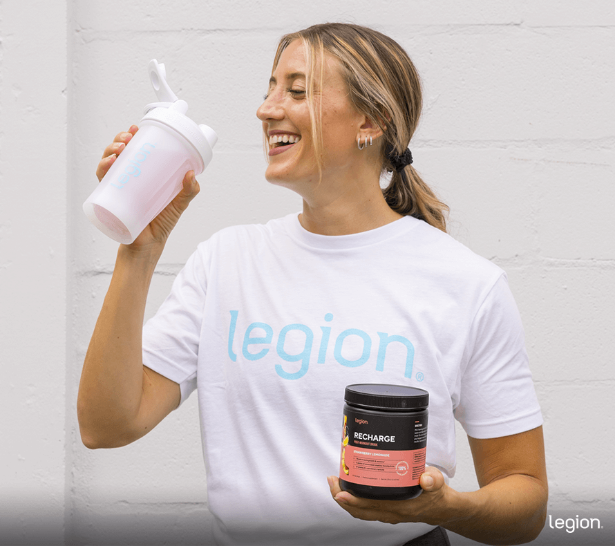 Athlete comparing creatine vs pre workout supplements before training. 