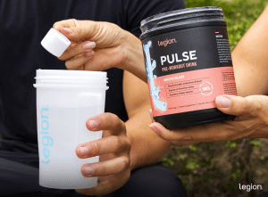 Two athletes preparing pre-workout, safe in the knowledge it isn't doesn't cause high blood pressure