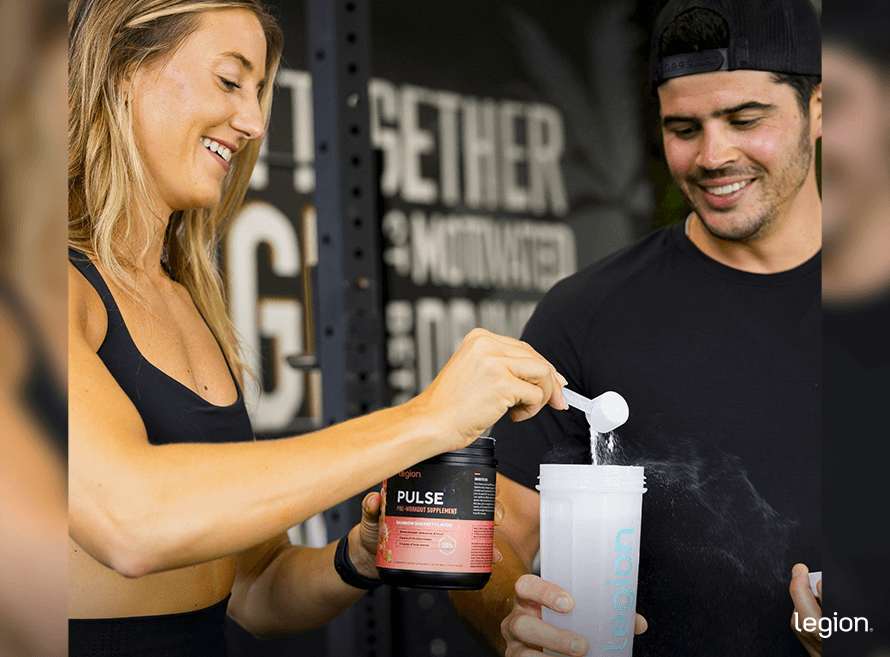 Athlete drinking pre-workout supplement, showing that pre-workout and protein powder are not the same