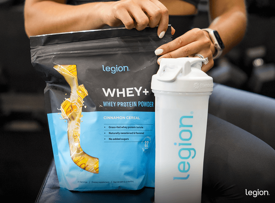 Athlete opening whey protein powder to support muscle recovery and daily protein intake