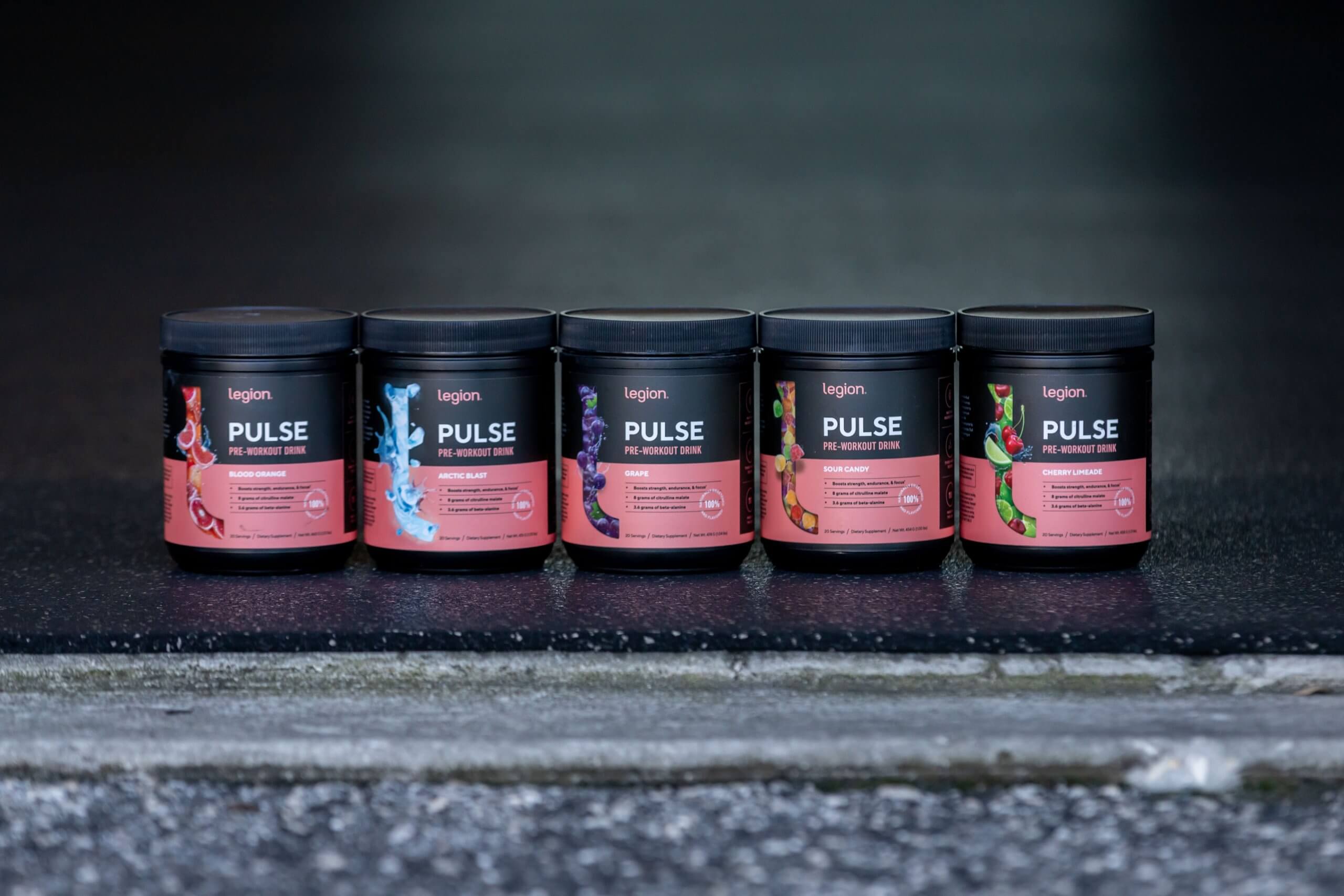 Bottles of Pulse pre-workout lined up, highlighting a beginner-friendly pre-workout formula.
