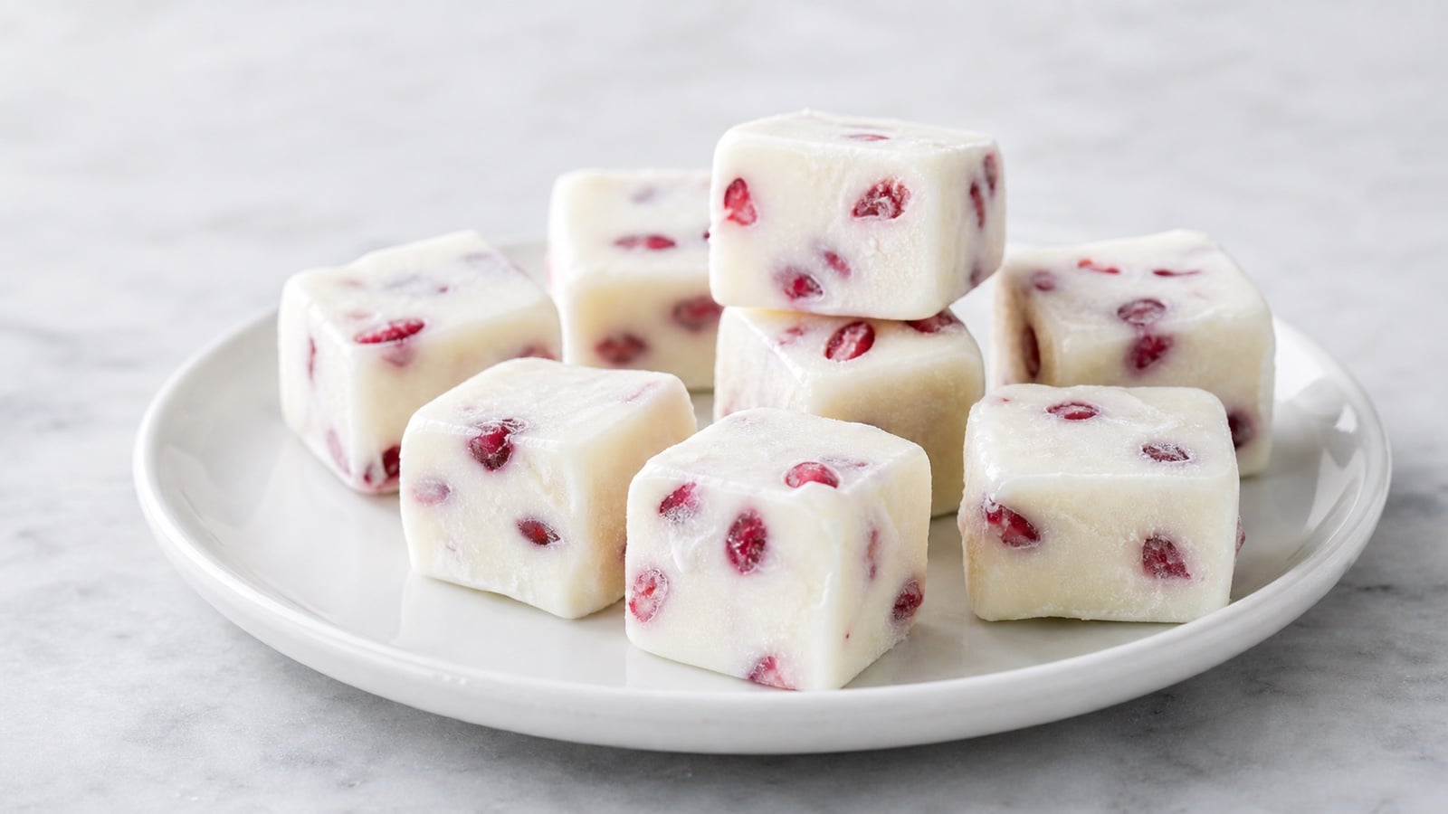 Frozen Greek yogurt bites studded with pomegranate arils