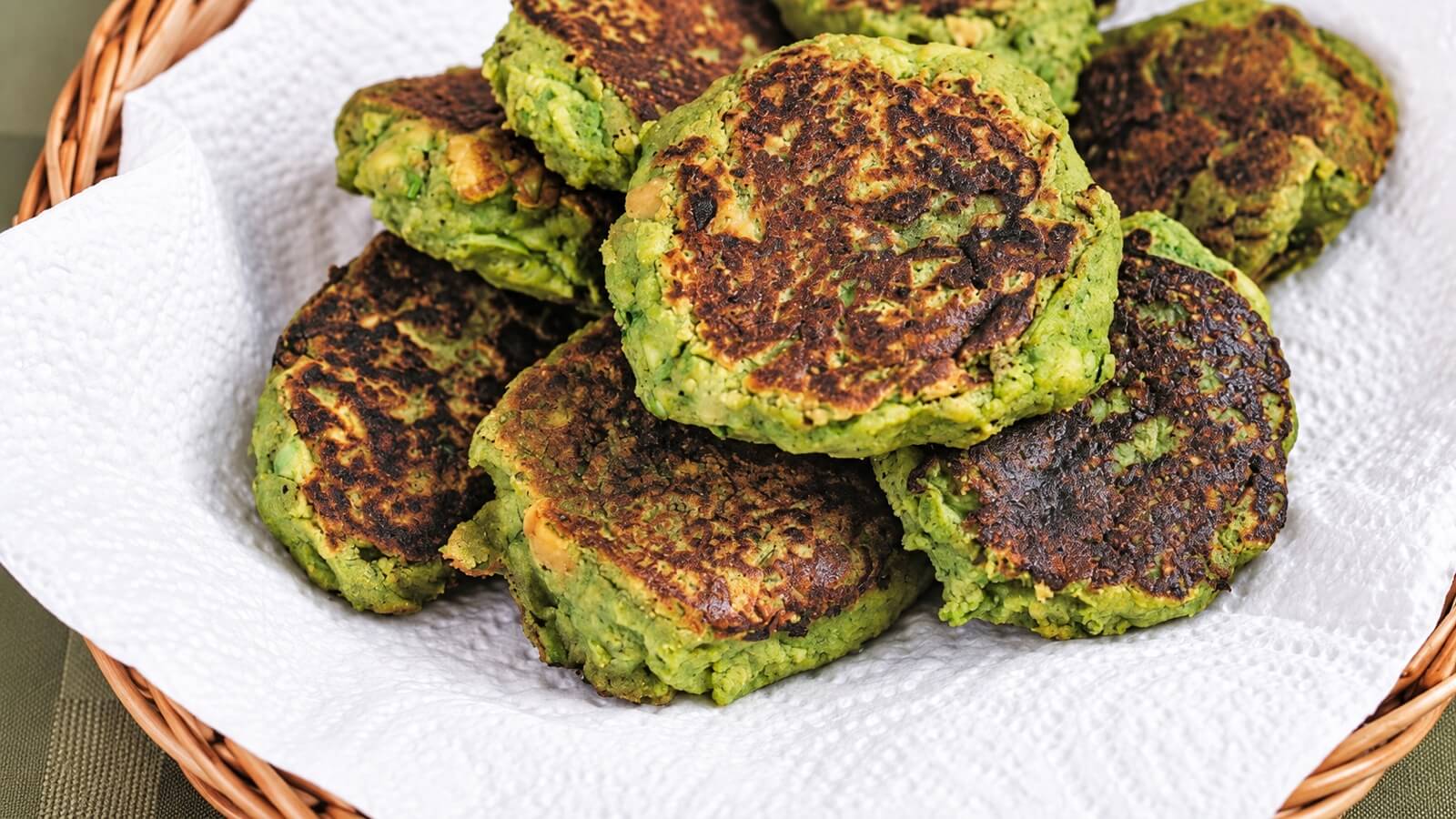 Cajun chickpea fritters in a paper-lined basket