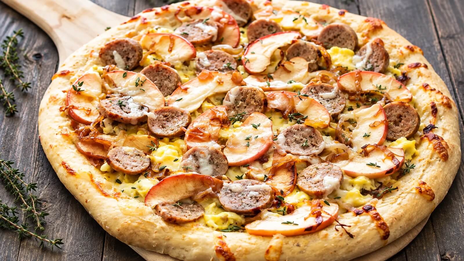 Sausage, apple, egg, and thyme breakfast pizza